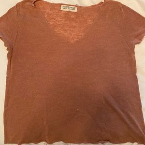 free people tshirt. tan peachy color